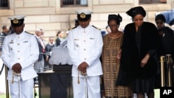 Nelson Mandela's widow Graca Machel leaves after viewing the casket at the Union Buildings in Pretoria, Dec. 11, 2013.