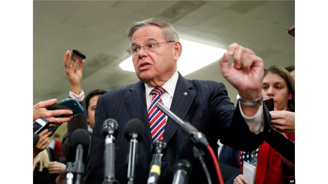 FILE - Sen. Bob Menendez, D-N.J., speaks to members of the media after leaving a closed-door meeting about Saudi Arabia with Secretary of State Mike Pompeo on Capitol Hill in Washington, Nov. 28, 2018.