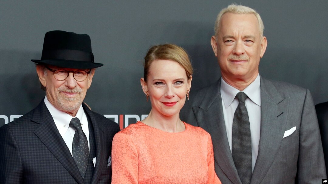 Director Steven Spielberg, actress Amy Ryan and actor Tom Hanks, from left, arrive for the International Premiere of the movie 'Bridge of Spies' in Berlin, Germany, Nov. 13, 2015.