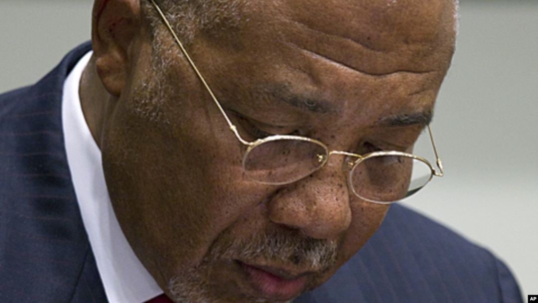 Former Liberian President Charles Taylor looks down as he waits for the start of a hearing to deliver verdict in the court room of the Special Court for Sierra Leone in Leidschendam, near The Hague, Netherlands, April 26, 2012. 