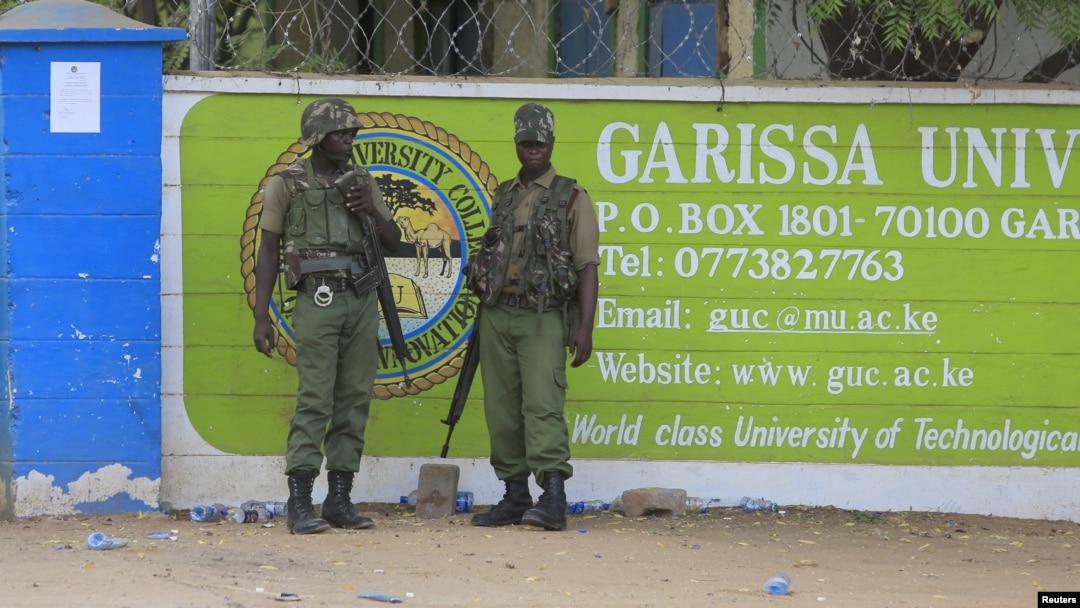 FILE - Kenya Administration policemen stand in front of Garissa University College in Garissa, April 4, 2015. 