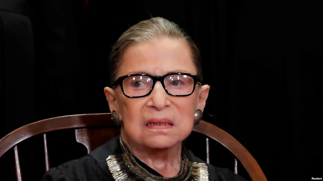 FILE - U.S. Supreme Court Associate Justice Ruth Bader Ginsburg is seen during a group portrait session for the new full court at the Supreme Court in Washington, Nov. 30, 2018. 