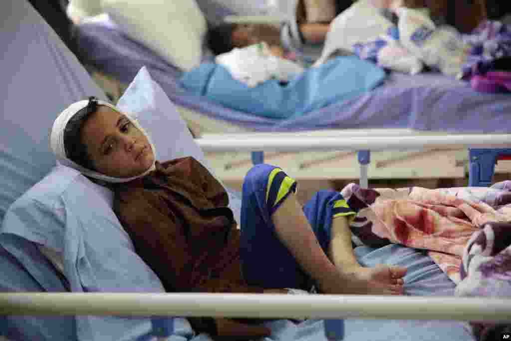 A child injured in a deadly Saudi-led coalition airstrike rests in a hospital in Saada, Yemen, Aug. 12, 2018.