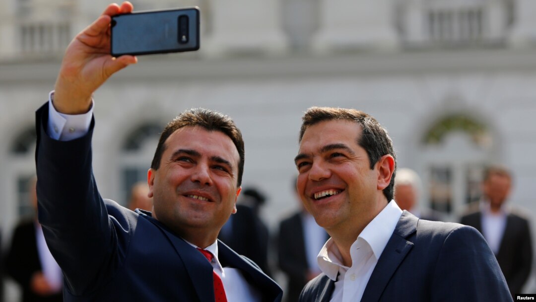 North Macedonia's Prime Minister Zoran Zaev, left, and Greek Prime Minister Alexis Tsipras attend a welcoming ceremony in Skopje, North Macedonia April 2, 2019. 