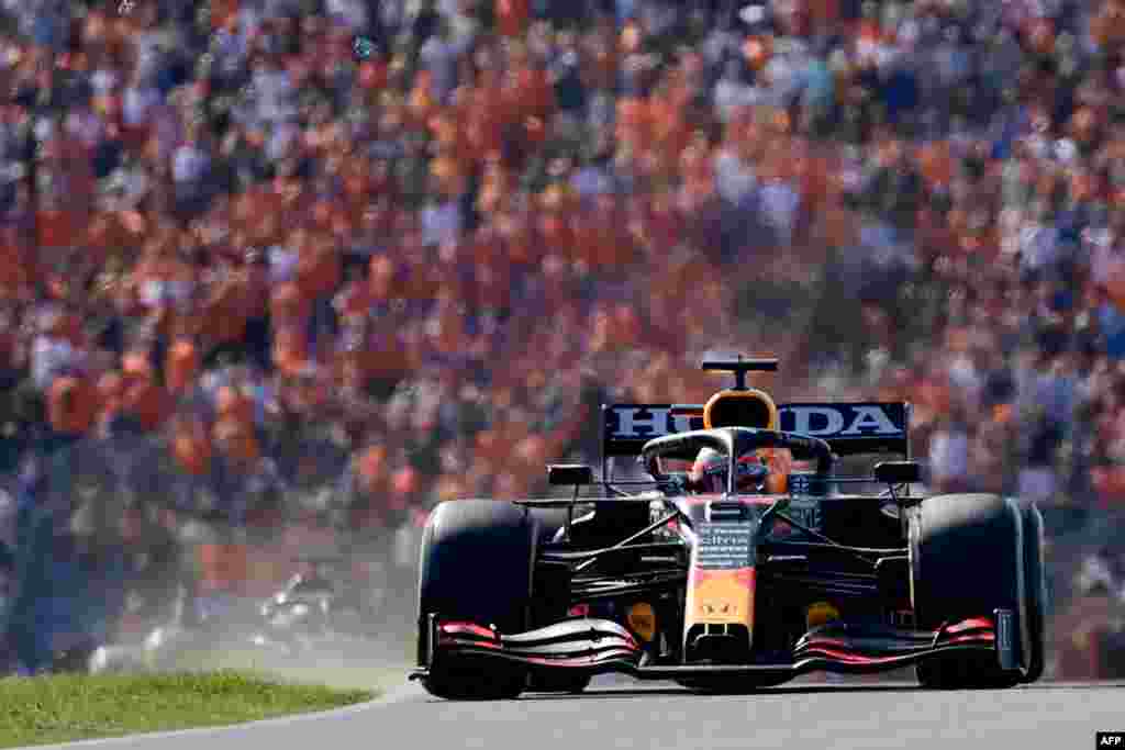 Red Bull's Dutch driver Max Verstappen races at the Zandvoort circuit during the Netherlands' Formula One Grand Prix in Zandvoort, Netherlands.