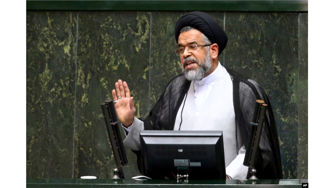 FILE - Iranian Intelligence Minister Mahmoud Alavi answers lawmakers' questions in a session of parliament in Tehran, Iran, Oct. 25, 2016. Alavi said in August that agents "spotted and thwarted more than 1,500 young people who intended to join" IS.