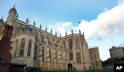 FILE - This Nov. 28, 2017 file photo shows a general view of St George's Chapel within the walls of of Windsor Castle, in Windsor, England. Britain's Prince Harry and Meghan Markle will marry at the chapel on May 19, 2018.