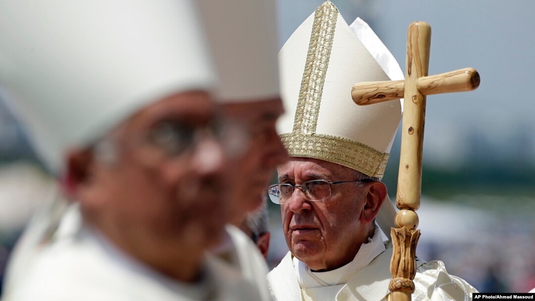 Pope Francis walks with his pastoral staff to celebrate a Mass in Guayaquil, Ecuador, July 6, 2015. 