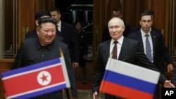 朝鲜领导人金正恩与俄罗斯总统普京在平壤会面。（2024年6月19日）