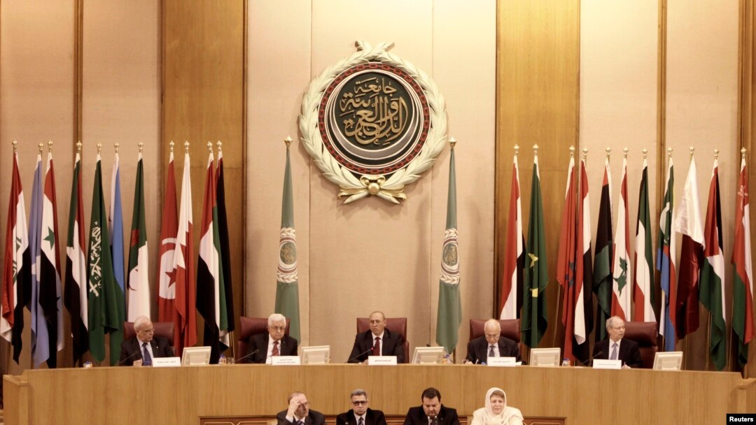 (L-R) Chief Palestinian Negotiator Saeb Erekat, Palestinian President Mahmoud Abbas, Libyan FM Mohamed Abdelaziz, Arab League Secretary-General Nabil Elaraby, Arab League's Deputy Secretary-General Ahmed Bin Hilli chair the Arab League Foreign Ministers e