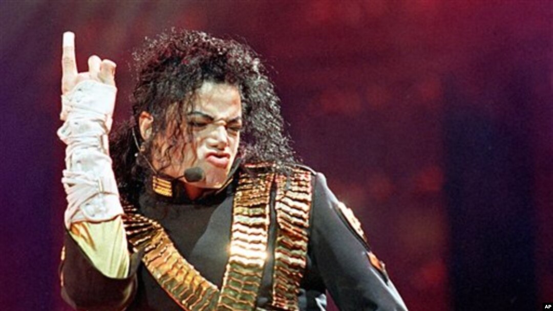 FILE - In this Aug. 25, 1993 file photo, American pop star Michael Jackson performs during his "Dangerous" tour in Bangkok.