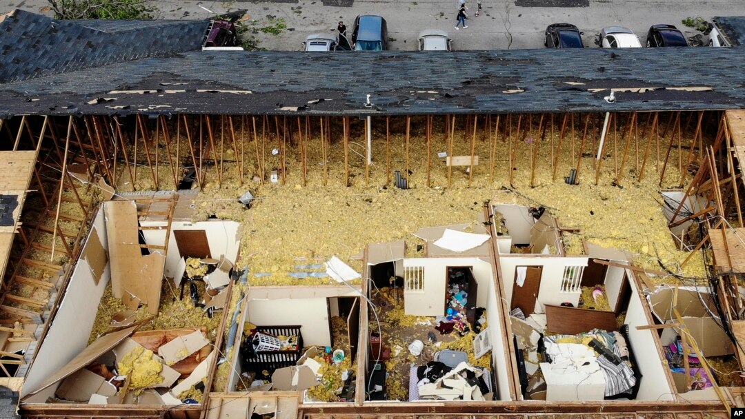 Damaged apartments are open up to the air at the Westbrooke Village Apartments in Trotwood, Ohio, after the roof was torn off from a severe storm the night before, May 28, 2019. 
