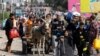 Palestinians fleeing north Gaza move southward, in the central Gaza Strip