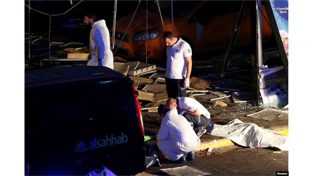 Forensic experts work outside Turkey's largest airport, Istanbul Ataturk, following a blast in Turkey, June 28, 2016.