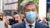 被控替香港当局在英国收集情报的两名男子将于明年2月接受审判