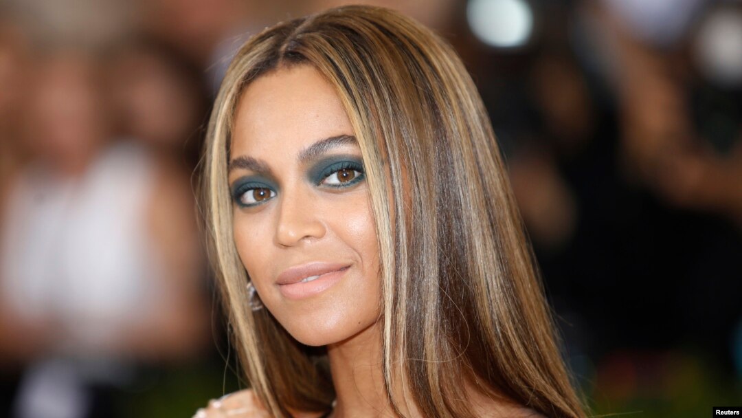 FILE - Singer-Songwriter Beyonce Knowles arrives at the Metropolitan Museum of Art Costume Institute Gala (Met Gala) to celebrate the opening of "Manus x Machina: Fashion in an Age of Technology" in the Manhattan borough of New York.