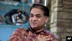 維吾爾族知名學者和經濟學家伊力哈木•土赫提(Ilham Tohti)資料照。
