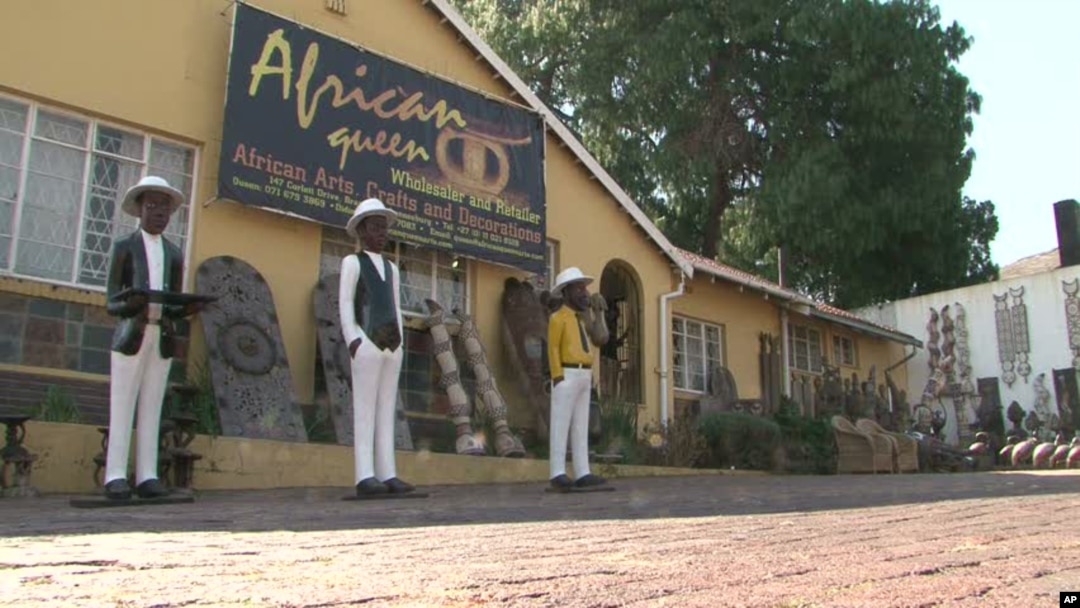 Reine Osso runs the "African Queen" Arts and Crafts store in Johannesburg, South Africa