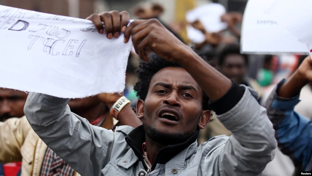 A protester chants slogans during a demonstration over what they say is unfair distribution of wealth in the country at Meskel Square in Ethiopia's capital, Addis Ababa, Aug. 6, 2016. 
