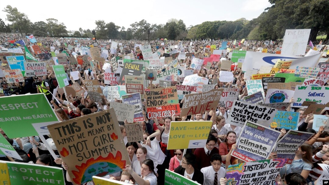 Thousands of protesters, many of them school students, gather in Sydney, Sept. 20, 2019, calling for action against climate change.