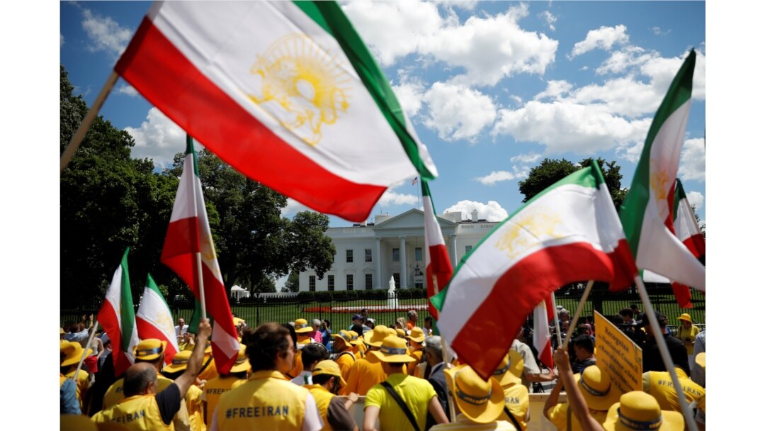 Activists hold an "Uprising for Regime Change" rally and "solidarity march with the Iranian resistance" outside the White House in Washington, June 21, 2019.