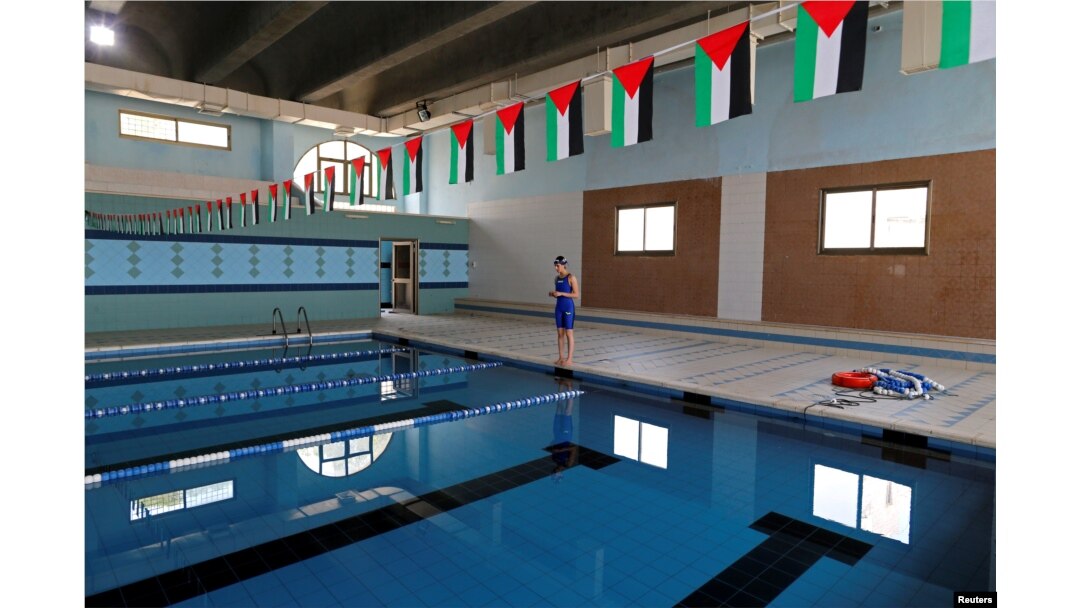 Palestinian swimmer Mary Al-Atrash, shown training in Beit Sahour, near the West Bank town of Bethlehem, June 27, 2016, will represent Palestine in the 50-meter freestyle at the 2016 Rio Olympics.