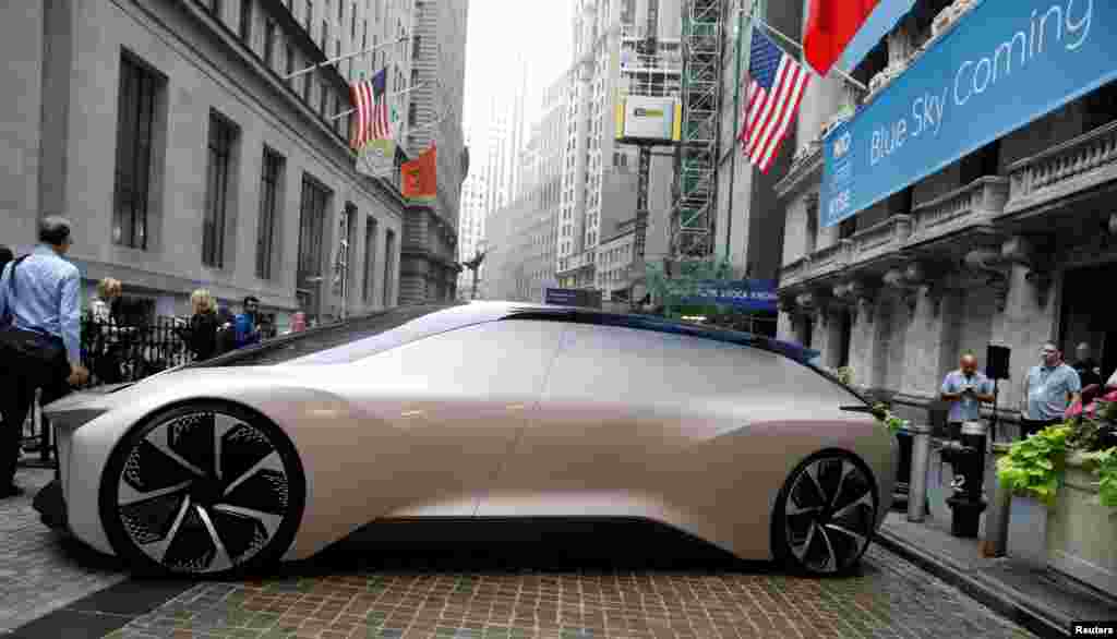 Chinese electric vehicle start-up NIO Inc. vehicle is parked in front of the New York Stock Exchange (NYSE) to celebrate the company’s initial public offering (IPO) in New York.