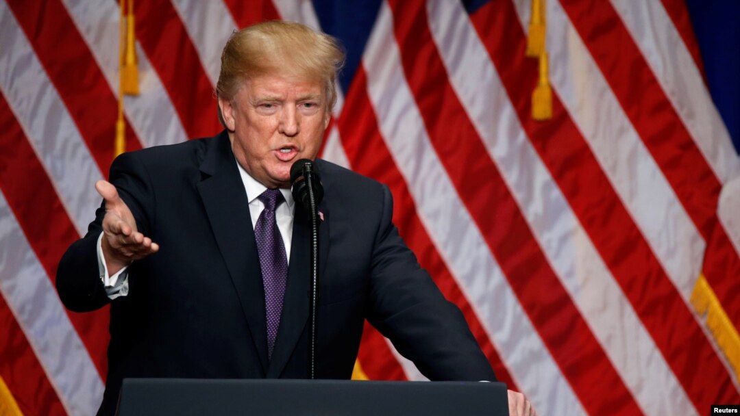 U.S. President Donald Trump delivers remarks at the Ronald Reagan Building and International Trade Center in Washington, Dec. 18, 2017. 