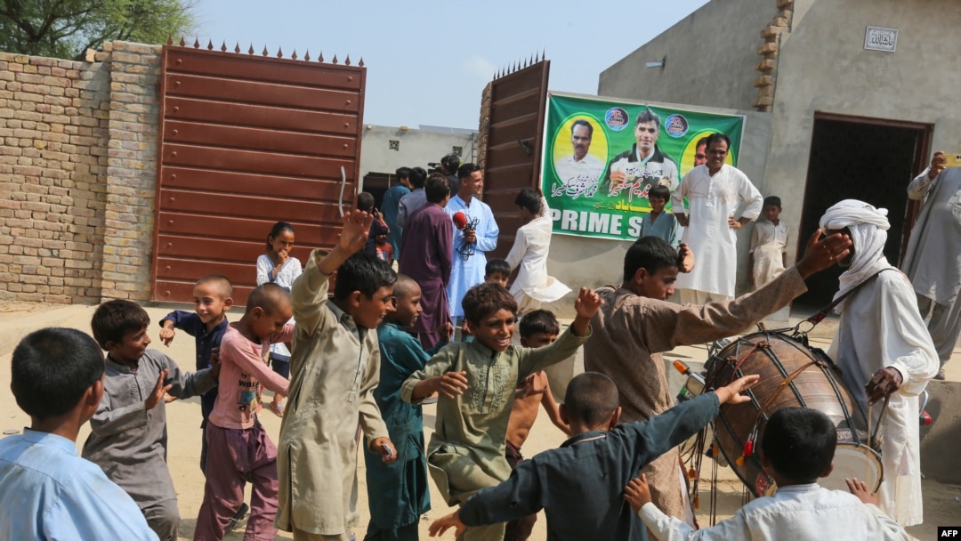 Villagers gather at the home of Olympic gold-medalist Arshad Nadeem in Mian Channu on Aug. 9, 2024, to celebrate his victory in the javelin throw at the Paris Olympics the day before. Nadeem ended Pakistan's decadeslong medal drought.
