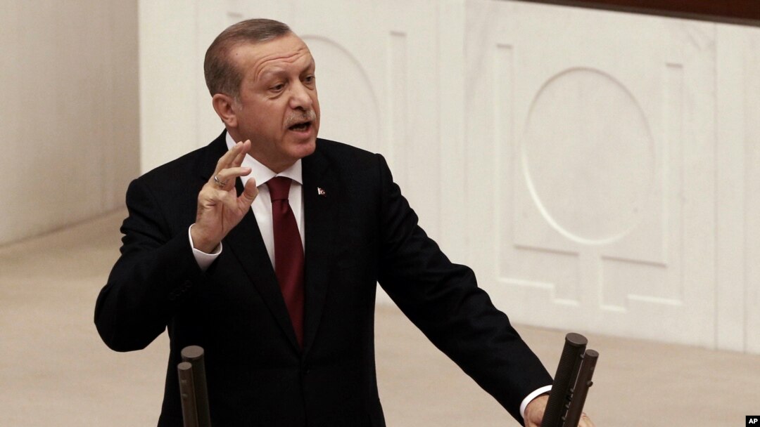 FILE - Turkey's President Recep Tayyip Erdogan addresses the parliament in Ankara, Turkey, Oct. 1, 2016.