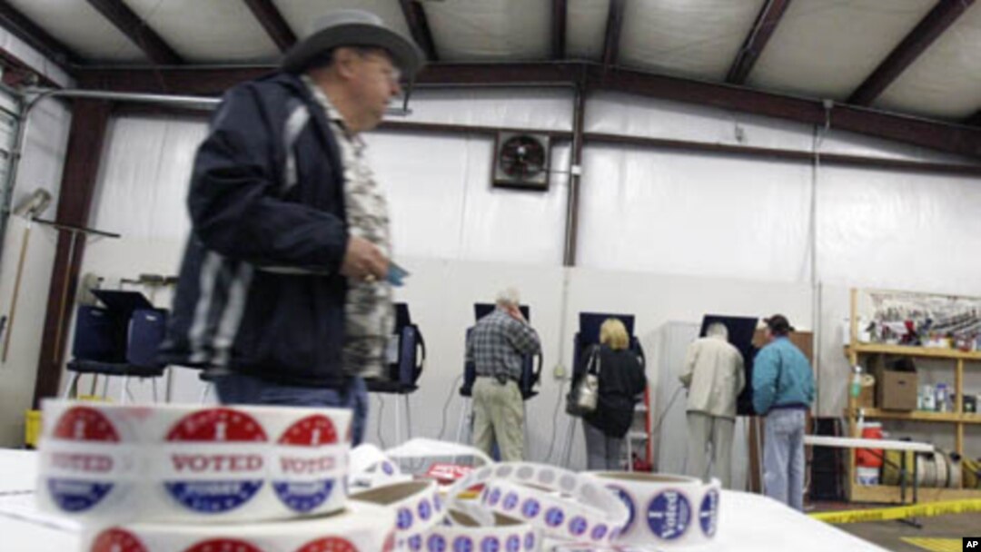 Voters cast ballots at Amick's Ferry Fire Station during the South Carolina presidential Primary in Chapin, South Carolina, January 21, 2012.
