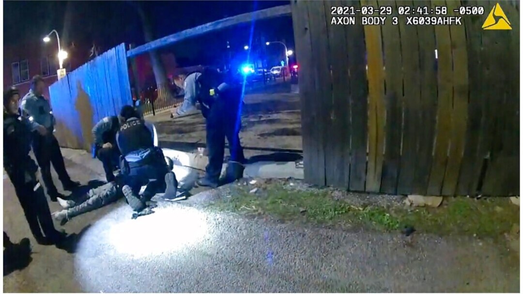 This March 29, 2021, photo from Chicago Police bodycam video shows Chicago Police performing CPR on 13-year-old Adam Toledo after being shot by Chicago Police in Chicago.