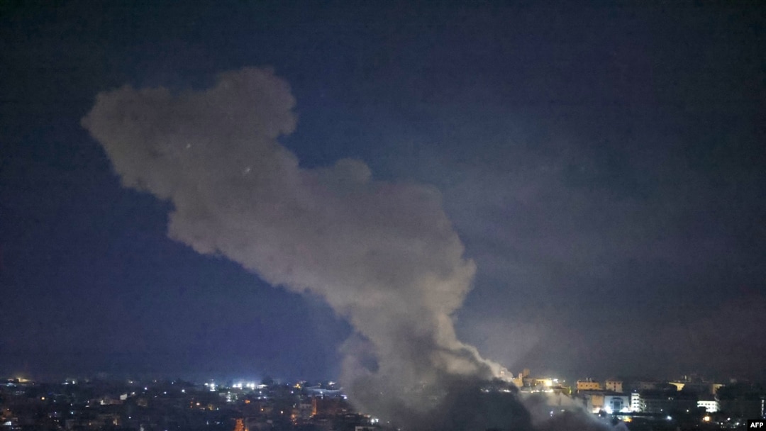 Smoke rises from the site of an Israeli airstrike targeting a neighborhood in southern Beirut on Nov. 13, 2024, amid the war between Israel and Hezbollah.