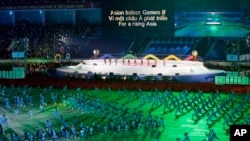 FILE - Martial arts performers are seen during the opening ceremony of the Third Asian Indoor Games at My Dinh National Stadium in Hanoi, Vietnam, Oct. 30, 2009. 