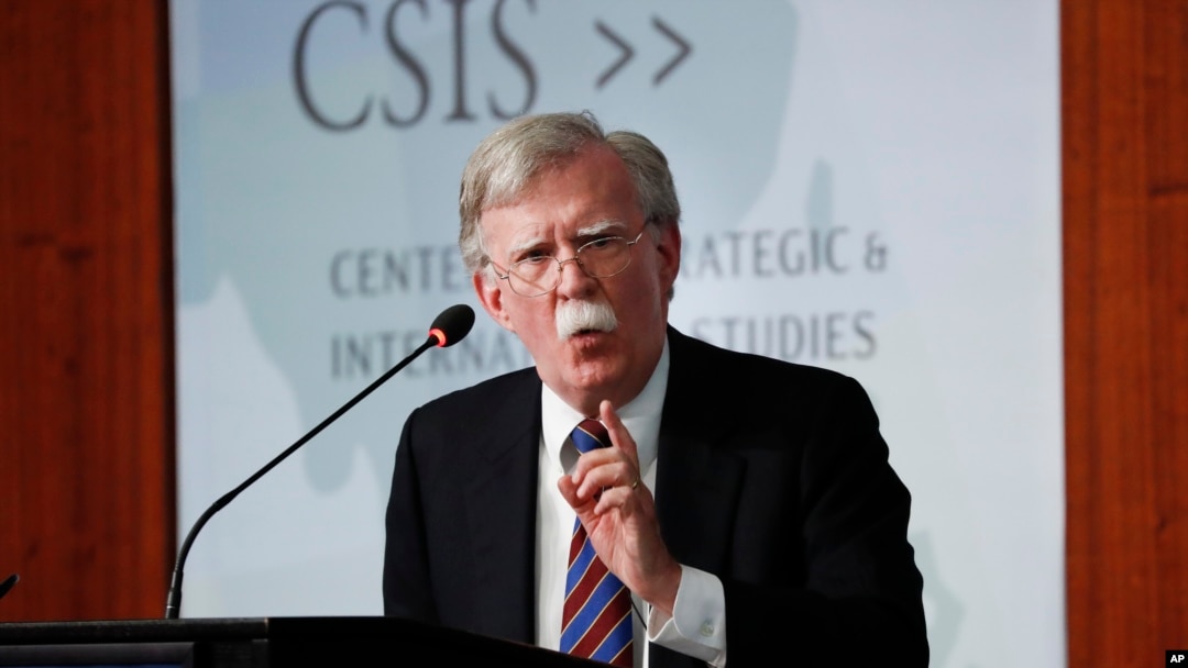 Former National Security Adviser John Bolton gestures while speaking at the Center for Strategic and International Studies in Washington, Sept. 30, 2019.