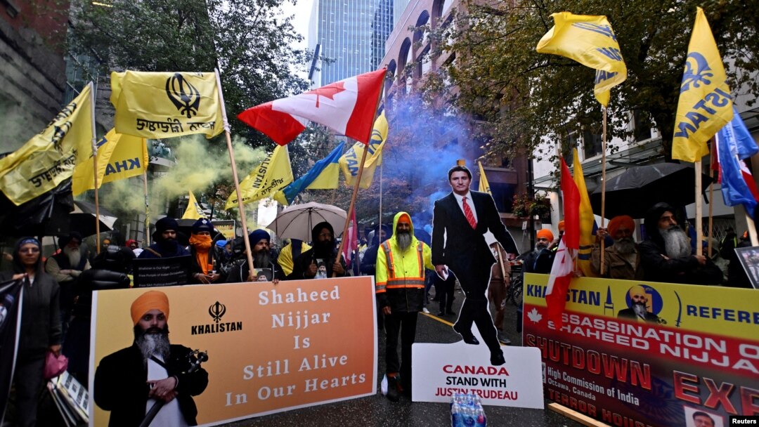 FILE - Demonstrators protest outside India's consulate in Toronto on Sept. 25, 2023, a week after Canadian Prime Minister Justin Trudeau raised the prospect of India's involvement in the murder of Sikh separatist leader Hardeep Singh Nijjar in Vancouver, British Columbia.