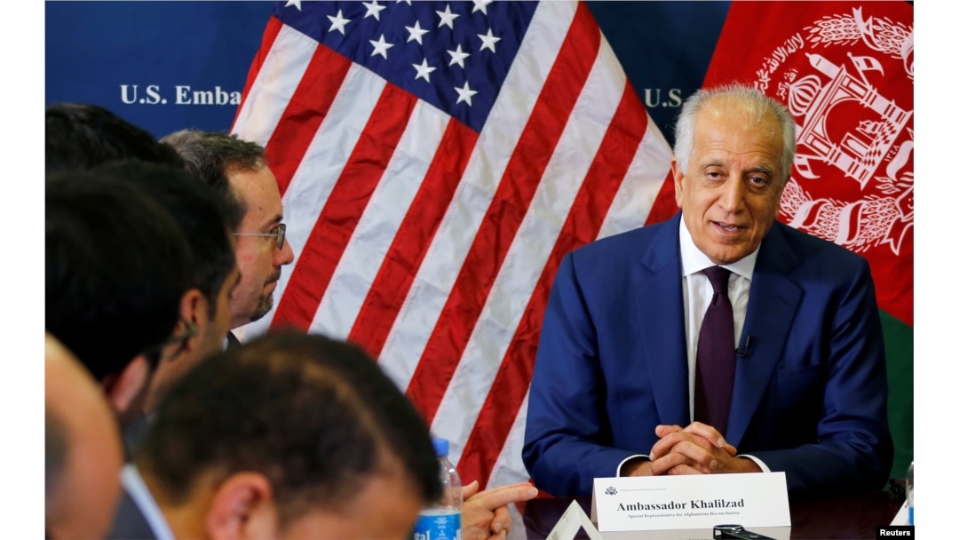 FILE - U.S. special envoy to Afghanistan Zalmay Khalilzad talks with local reporters at the U.S. Embassy in Kabul, Afghanistan, Nov. 18, 2018. (U.S Embassy handout via Reuters)