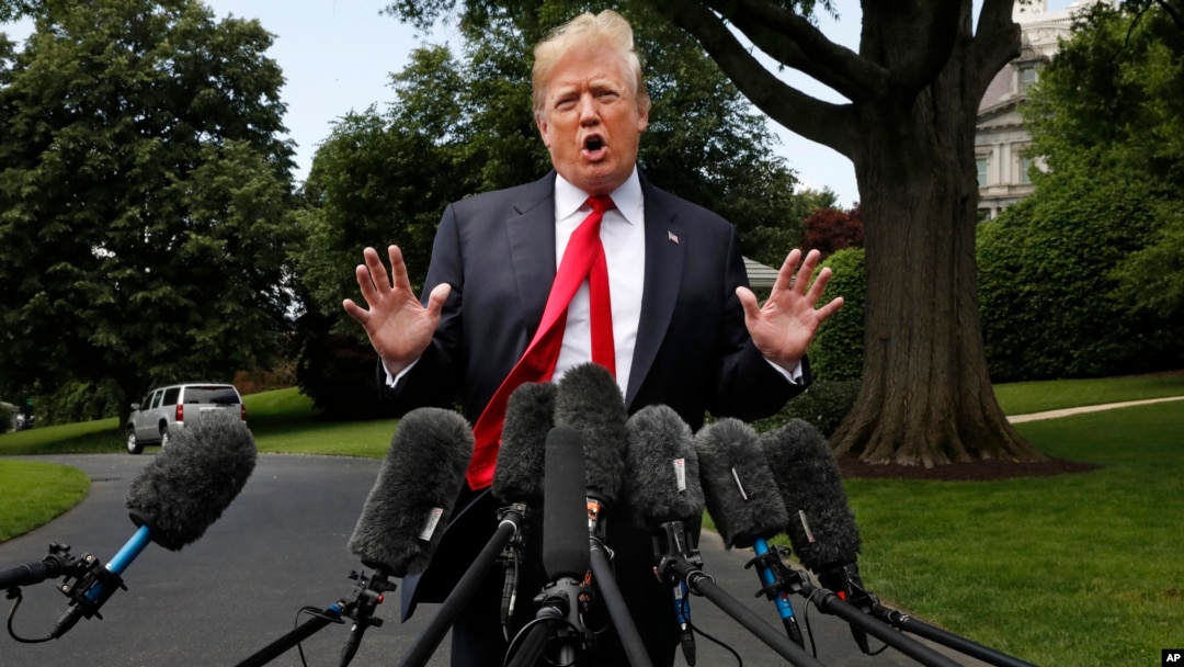 President Donald Trump speaks to the media on the South Lawn of the White House in Washington, May 23, 2018, en route to a day trip to New York. 