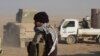 Iraqi soldiers have diverse opinions on the new U.S. president, with some saying he seems strong against terrorism and other saying he appears to dislike Muslims in Ganus al-Ulya, Iraq, Dec. 10, 2016. 