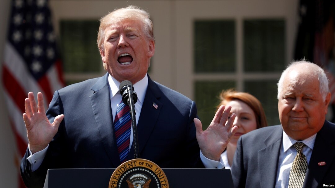 FILE - U.S. President Donald Trump gives remarks on tax cuts for American workers at the White House, Washinton, Apr. 12, 2018. 