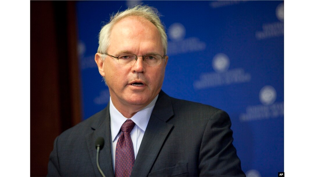 FILE - Former U.S. Ambassador to Iraq Christopher Hill speaks in Washington, Aug. 8, 2010.
