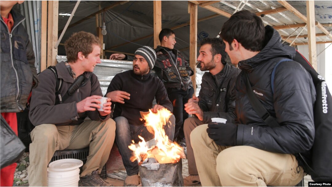 The "Salam Neighbor" filmmakers meet with refugees in Jordan's Za'atari camp. (Credit: Living on One/1001 Media)