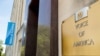 FILE - Signage is seen on the Voice of America building in Washington, June 15, 2020.