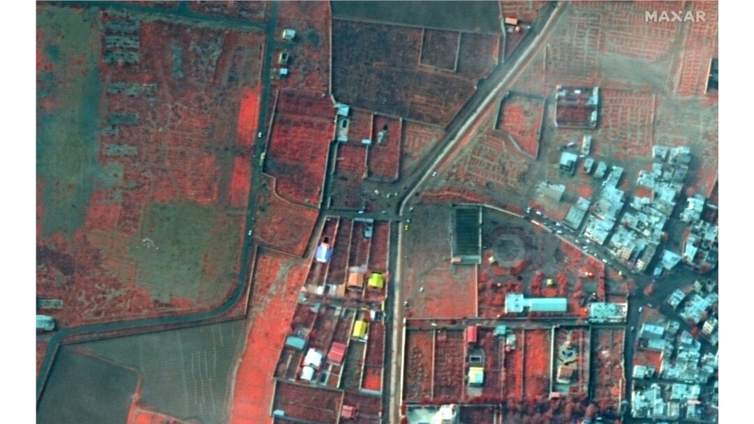 A color-infrared view shows the area where an Ukraine International Airlines plane crashed after takeoff from Iran's Imam Khomeini airport, on the outskirts of Tehran, Maxar's WorldView-2 satellite image taken Jan. 9, 2020.