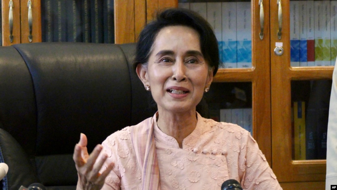 FILE - Myanmar opposition leader Aung San Suu Kyi speaks to journalists during a press conference at a parliament building, April 9, 2015.