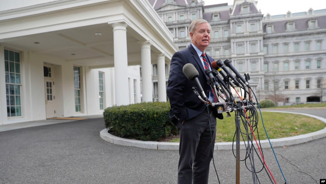 Republican Sen. Lindsey Graham speaks to members of the media outside the West Wing of the White House in Washington, after his meeting with President Donald Trump, Dec. 30, 2018.