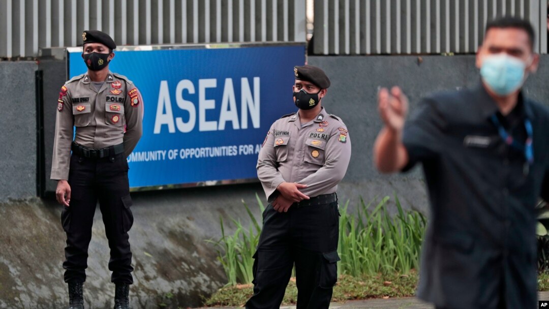 Police officers stand guard outside the Association of Southeast Asian Nations (ASEAN) Secretariat ahead of a leaders' summit to discuss Myanmar on Saturday in Jakarta, Indonesia, April 23, 2021.