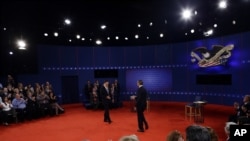 President Barack Obama and Republican presidential candidate Mitt Romney participate in the second presidential debate at Hofstra University in Hempstead, New York, October 16, 2012.