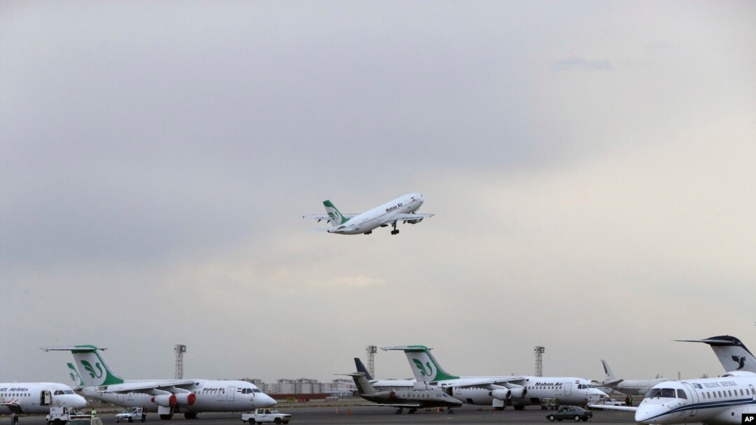 FILE - A Mahan Air passenger plane takes off from Mehrabad Airport in Tehran, Iran, Feb. 7, 2016.