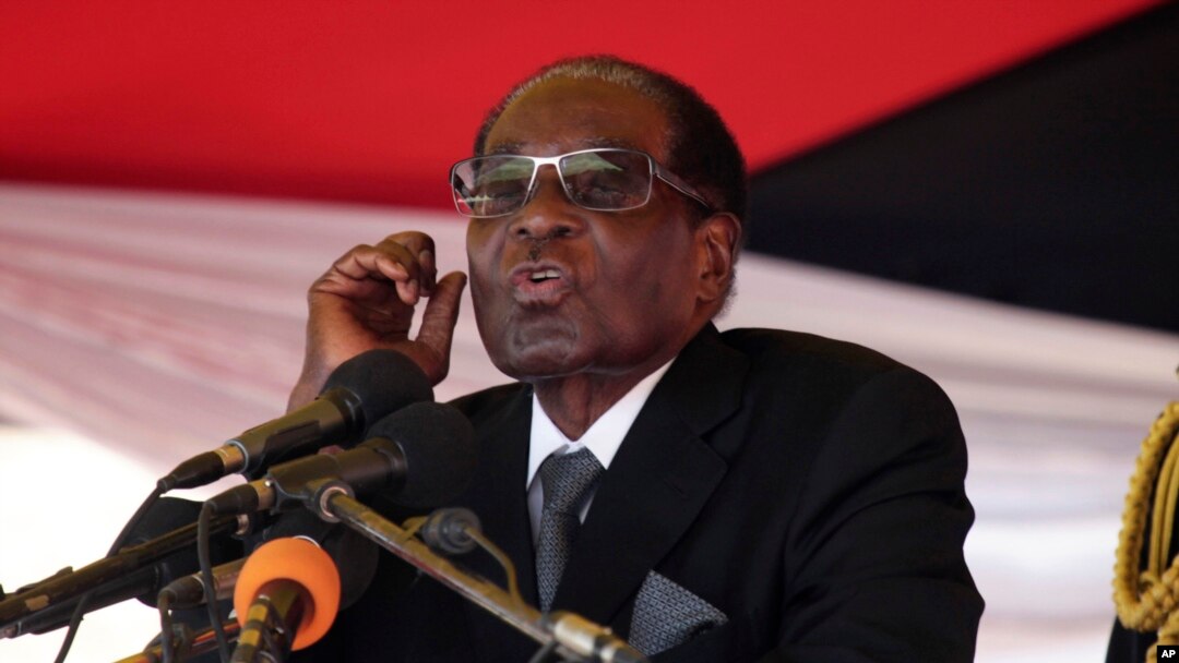 FILE - Zimbabwean President Robert Muagbe addresses mourners at the Heroes Acre in Harare, Nov. 1, 2017.